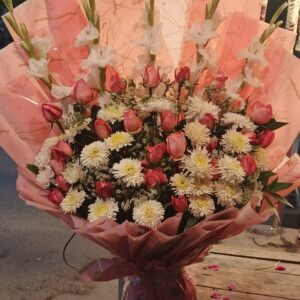 Mixed Rose, Chrysanthemum, and Gladiolus Bouquet in Peach Marble Wrap