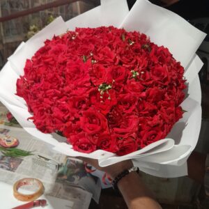 Red Roses Bouquet In white sheet