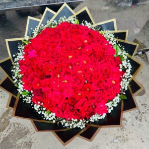 Red Rose Bouquet With Baby Breath In Black wrapping Sheet