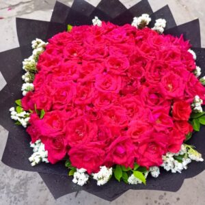 Red Rose Bouquet In Black Sheet